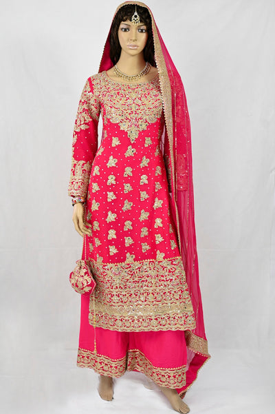 mehndi-outfit-in-hot-pink-gold-embroidery