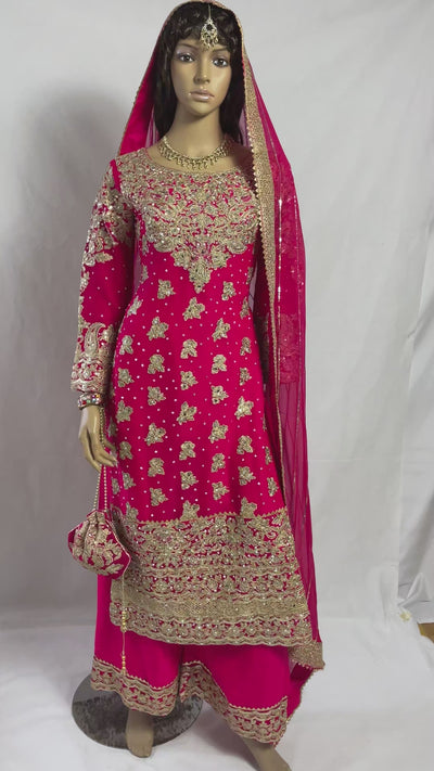 video-of-mehndi-outfit-in-hot-pink-gold-embroidery