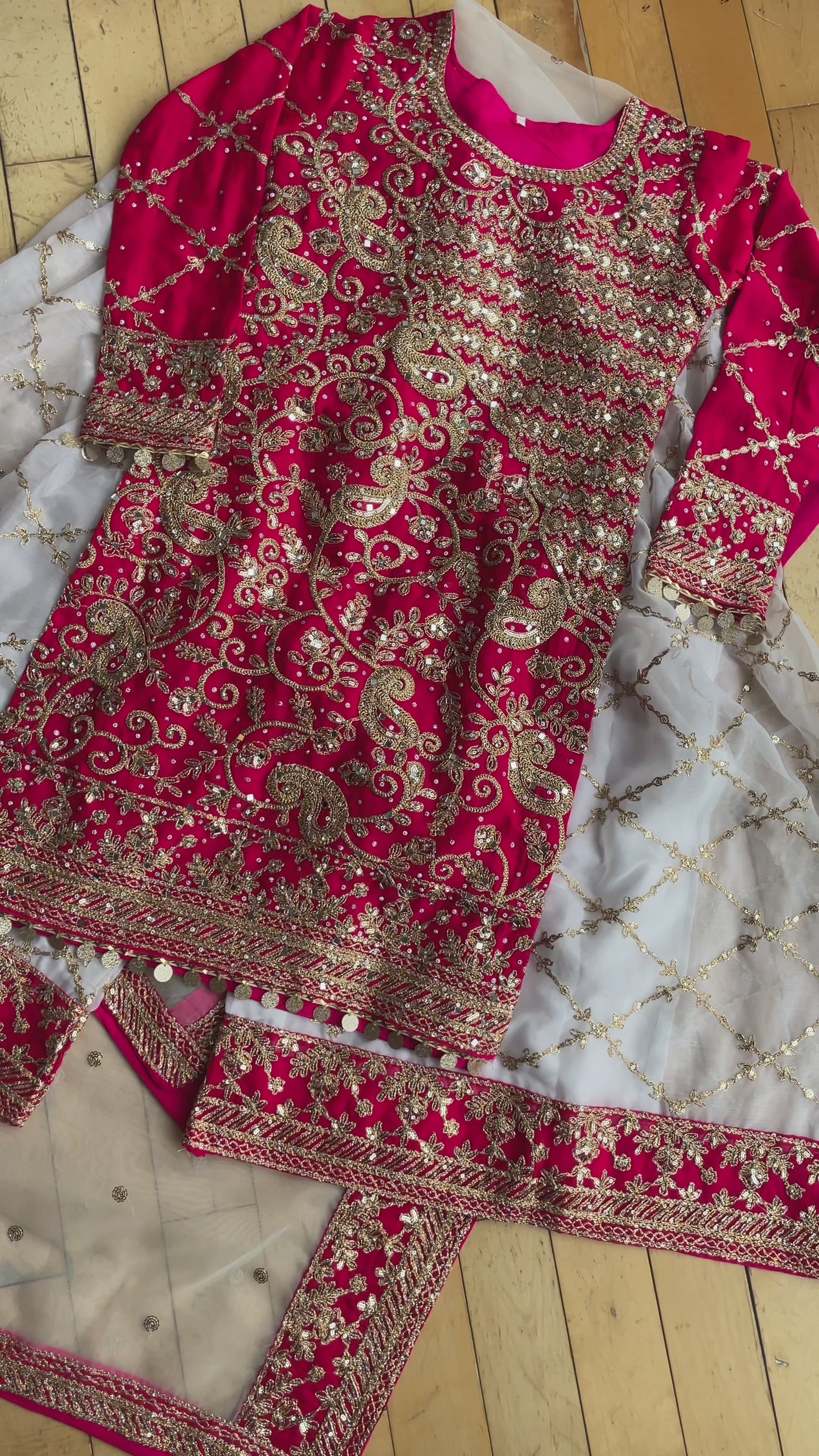 video-showing-pink-sharara-mehendi-suit-gold-embroidery