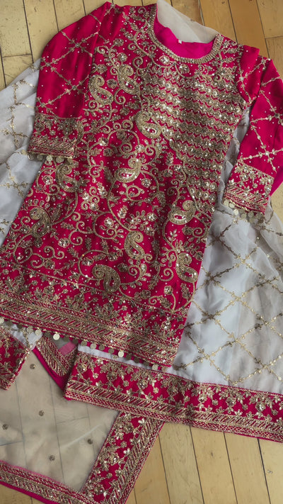 video-showing-pink-sharara-mehendi-suit-gold-embroidery