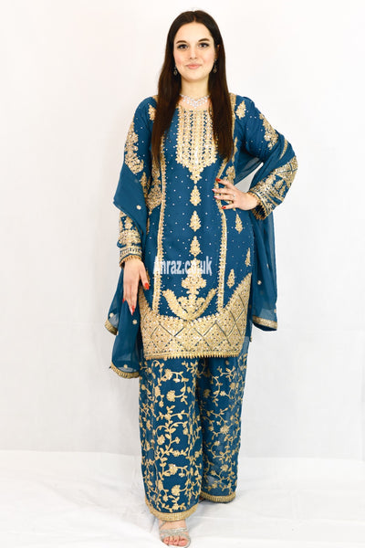 showing-teal-blue-plazzo-lehnga-front